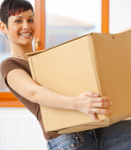 lady carrying a moving box
